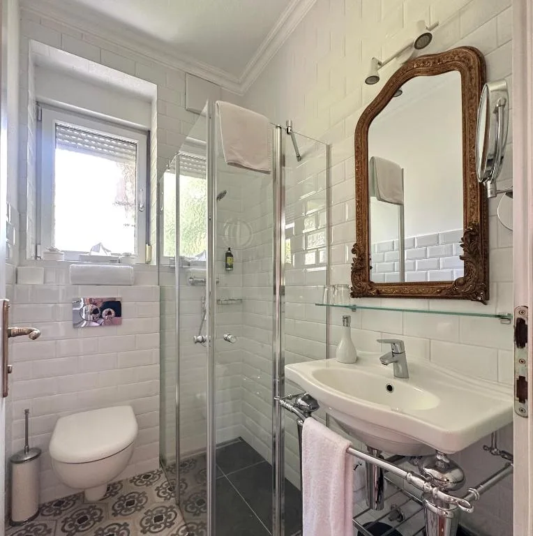 Double Room bathroom with a glass shower enclosure