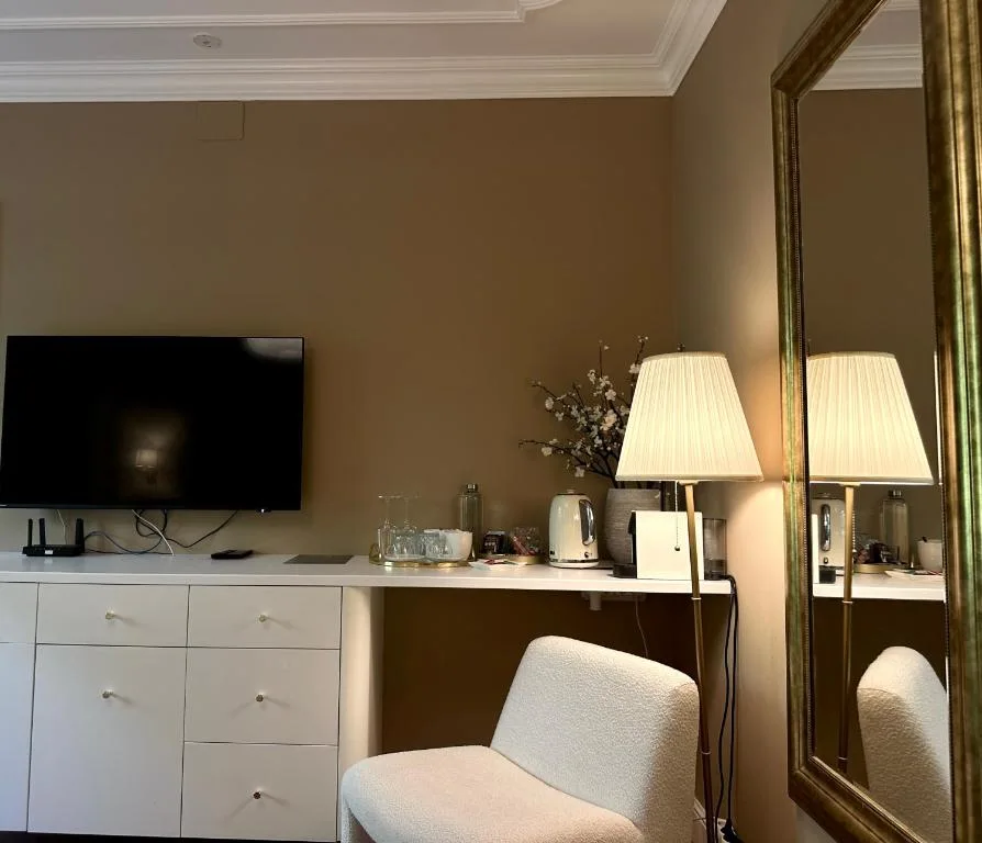 Writing desk and television in the Double Room