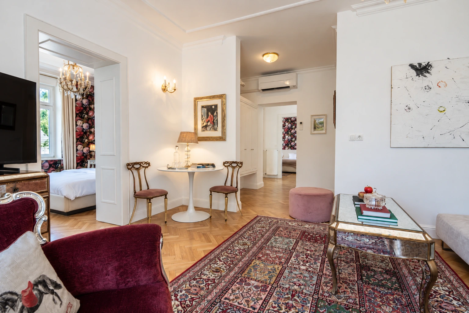 Executive Suite living room with a sofa and armchair